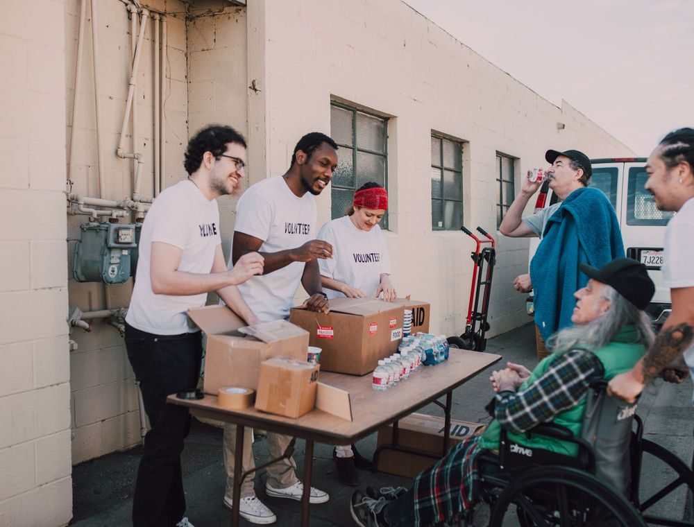 Volunteers distributing community support
