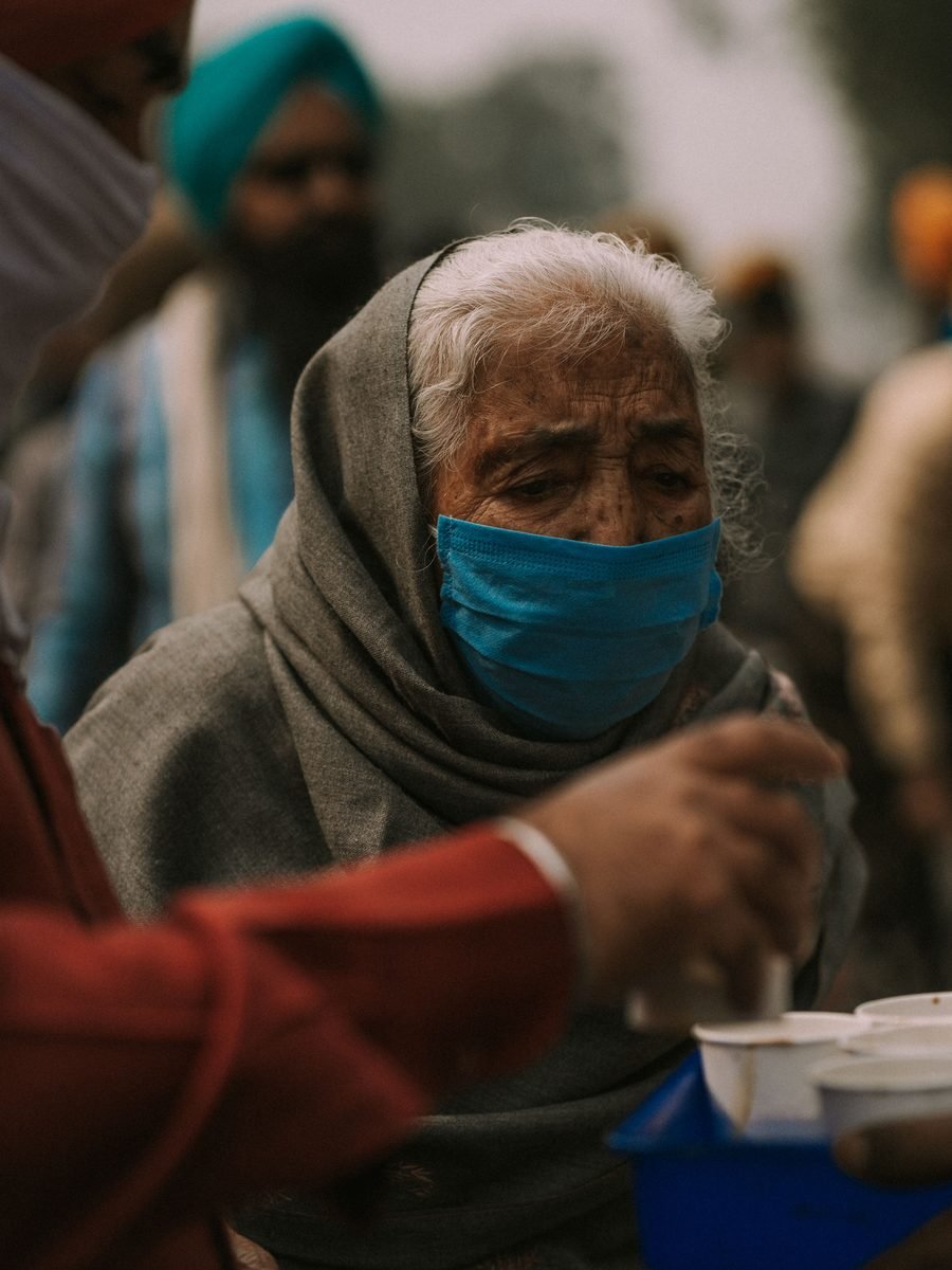 Senior citizens participating in an NGO community gathering