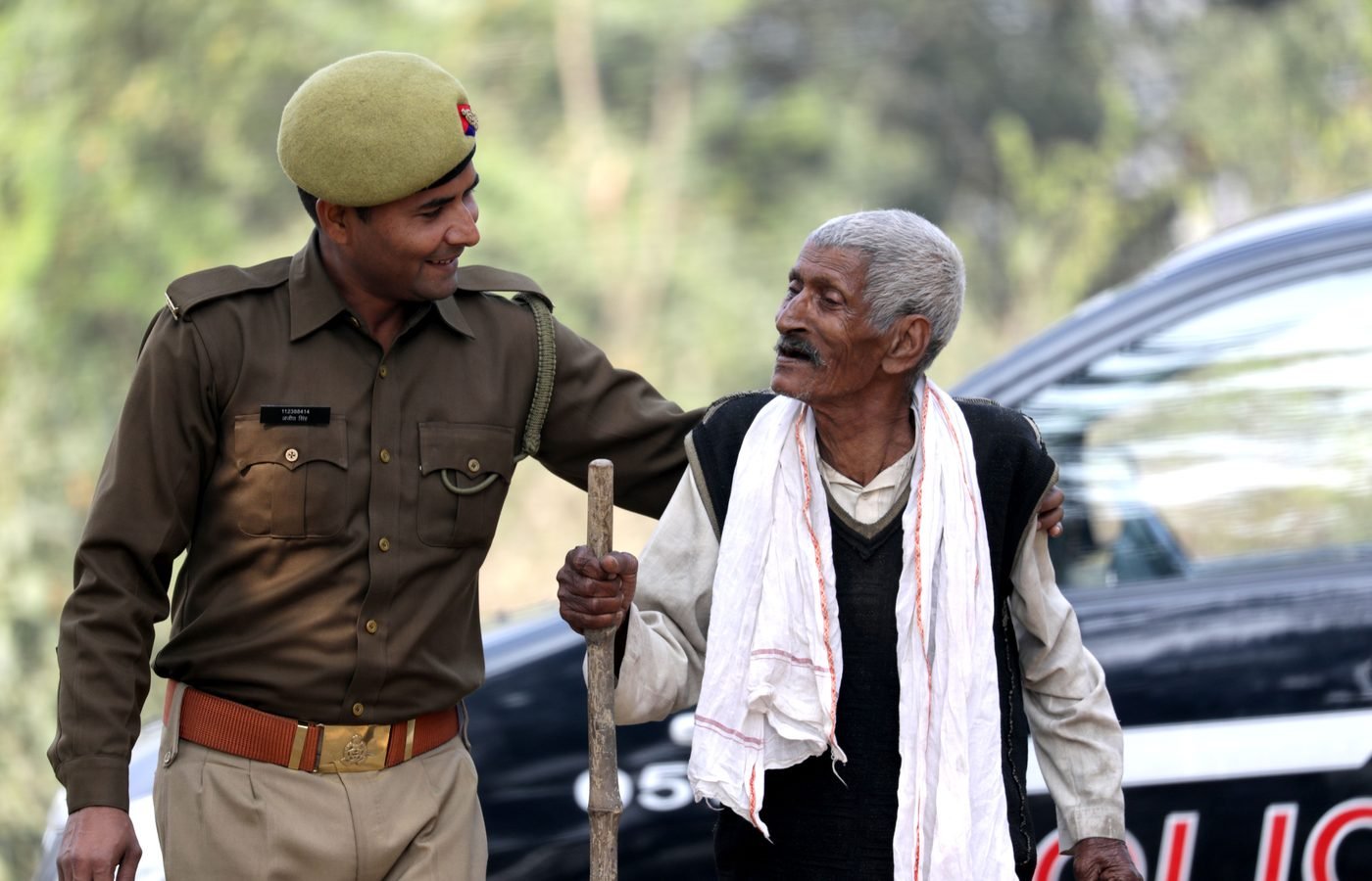 Volunteer helping a senior citizen with daily support