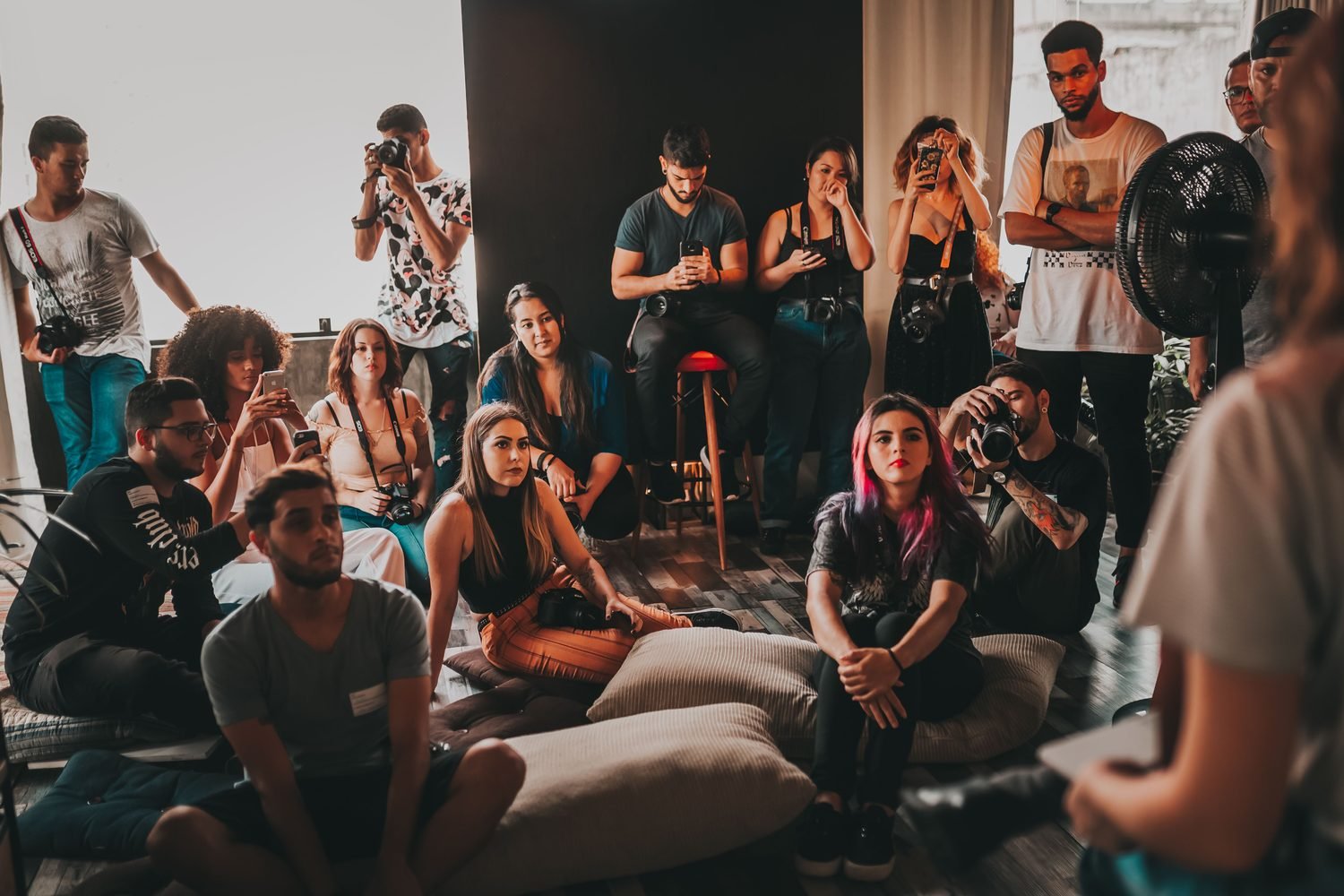 Community workshop participants listening to a speaker